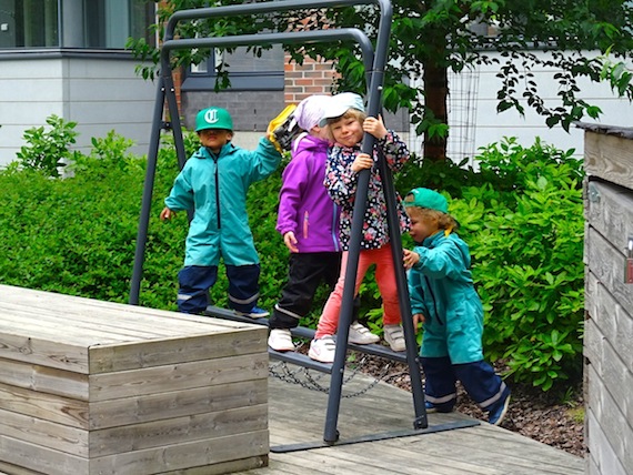 A group of older kids at the Máttabiegga Giellabeassi language nest play outside their day centre located close to the heart of Helsinki in southern Finland. (PHOTO BY JANE GEORGE)