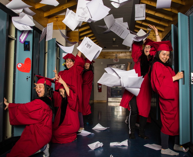 Arctic Bay high school graduates enjoy a little impromptu celebration at the school recently. Arctic Bay graduated nine students this year including, in this photo, Candace Barnabas, Tapia Attagutsiak, Rosalie Oqallak, Angela Attagutsiak, Mickey Iqaqrialu, Leetia Kalluk, and Ashley Kalluk. Missing from photo Carlton Reid and Michael Inutiq. Nunatsiaq News sends out our congratulations to these and all grads across Nunavut. (PHOTO BY CLARE KINES)