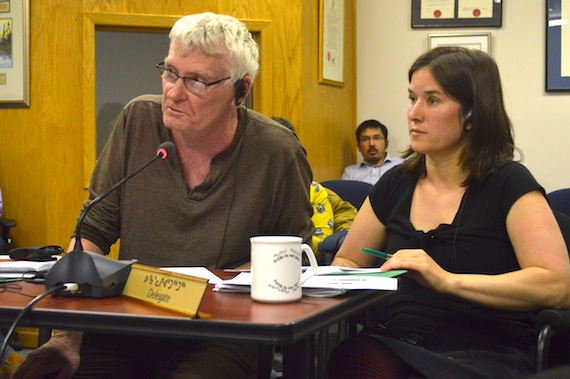 At the July 26 Iqaluit city council meeting, Nunavut Brewery partner Ambrose Livingstone, flanked by the city’s planning and development director Mélodie Simard, give councillors details of the 609 square-metre facility, which will be located on Iqaluit Lane near the borders of Sylvia Grinnell Territorial Park. (PHOTO BY STEVE DUCHARME)