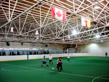 In a photo taken in 2009, youth from the Kitikmeot region play soccer on artificial turf installed at the Kugluktuk arena and community centre. (FILE PHOTO)