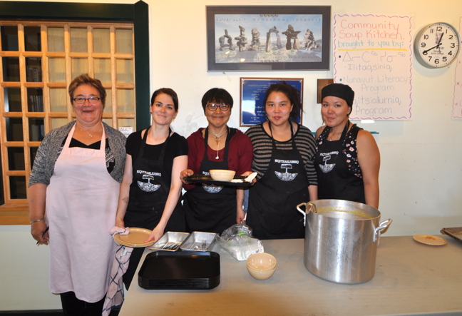 Nunavut Arctic College cooking instructors Rosemary Sandy and Kelly Clark Lindell with students Lena Siutinuar, Jerlayn Kaludjak and Cassandra Gordon Aug. 11 at the Rankin Inlet community soup kitchen where, every Thursday during lunch hour, they put their new skills to use feeding hungry people. Missing from photo: student Diana Kaludjak. (PHOTO BY NOEL KALUDJAK)