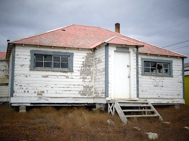 This federal building, which once housed a school, and then the RCMP detachment, will find a new home in Cambridge Bay's heritage park. (PHOTO BY JANE GEORGE)