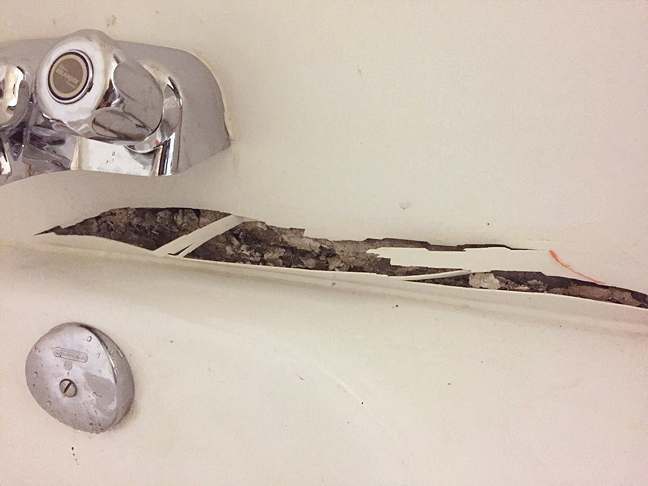 Cracks in the bathroom of the Q residence rooms appear to be growing mould. (PHOTO SUPPLIED)