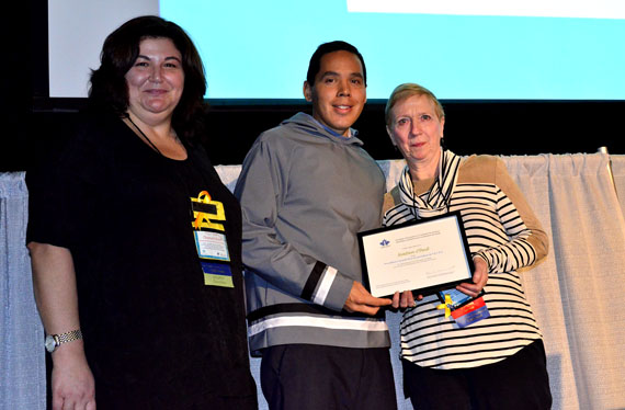 ITK President Natan Obed, standing with CASP 2016 co-chair Charlotte Borg, receive's CASP's president's award Oct. 27 from CASP president Renée Ouimet. (PHOTO BY JIM BELL)