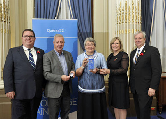 Kuujjuaq elder and community leader Martha Koneak Greig, centre, is the recipient of this year’s Prix Hommage Aînés for Nunavik, an honour handed out to seniors in each of Quebec’s regions for their outstanding contributions. From left, Geig is pictured with Ungava MNA Jean Boucher, her husband Neil Greig, Francine Charbonneau, Quebec minister for Seniors and the fight against bullying, and Luc Blanchette, minister responsible for the Nord-du-Québec region, at a Nov. 10 ceremony in Quebec City. Greig is a municipal councillor in Kuujjuaq, where she also serves as a funeral director, midwife, counsellor and an active member of the local Anglican church. She is one of 18 recipients of this year’s award. (PHOTO COURTESY OF THE GOVERNMENT OF QUEBEC)