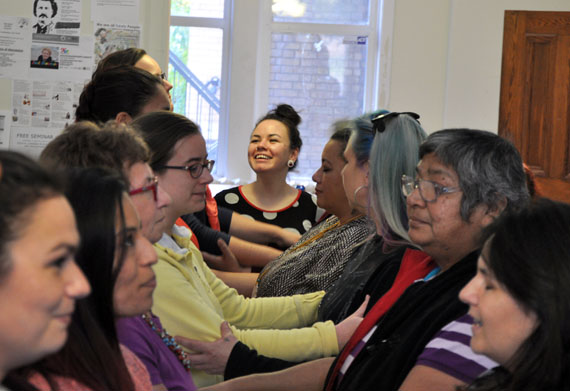 Ha-mmm-beh, ha-mmm-beh: Kathleen Ivaluarjuk Merritt, who performs as IVA, lines up a group of pairs as part of a throat singing workshop she leads at the Native Women's Resource Centre in Toronto Nov. 4. Merritt is in Toronto as part of the Native Women in the Arts' Kwe performance series, which featured an Inuit showcase this past weekend, including performances by IVA, Arviat's Agaaqtoq, spoken work artist Taqralik Partridge and Nukariik, throat singers Karin and Kathy Kettler. (PHOTO BY SARAH ROGERS)