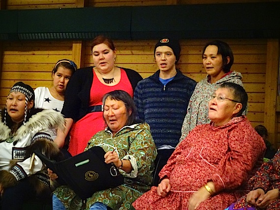 The language courses, which will take place in 2017 in the Kitikmeot region of Nunavut, flow from the efforts of Kitikmeot Inuit Association language, culture and youth program co-ordinators, Julia Ogina (bottom, second from left) and Sarah Jancke (top, second from left), seen here singing drum dance songs with others last October at the KIA's community feast. (FILE PHOTO)