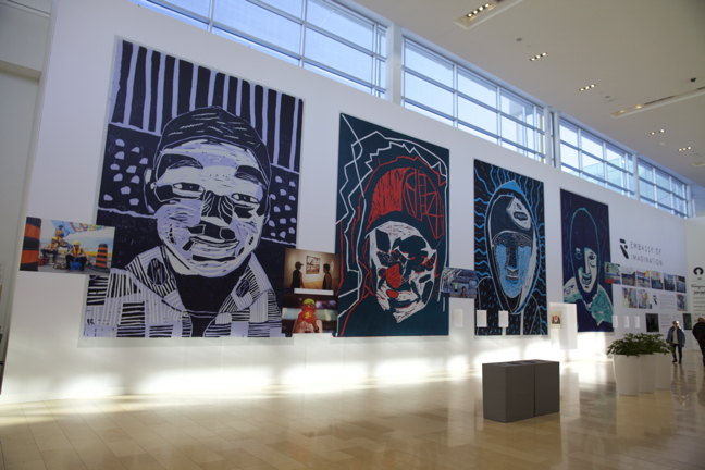 Self portraits by Cape Dorset youths adorn the walls of Mississauga's Square One Mall, just west of Toronto. From left: Tommy Quvianaqtuliaq, Latch Akesuk, Cie Taqiasuk and Holly Josephee. (PHOTOS COURTESY EOI)