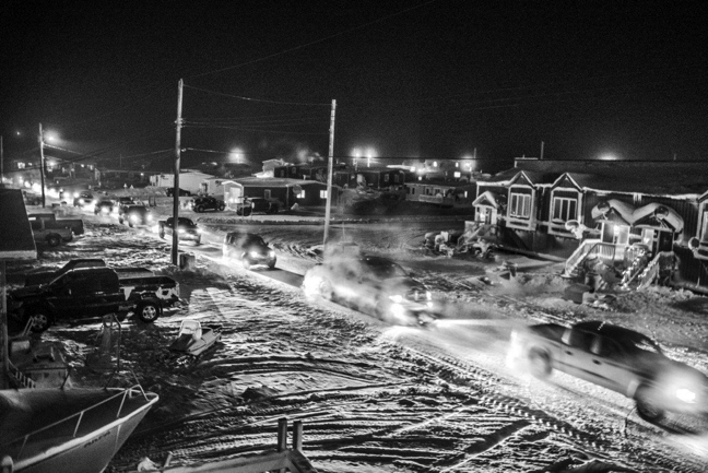 Happy New Year from Rankin Inlet: The hamlet's fire truck and ambulance lead a parade of vehicles through town around 7:30 p.m. Dec. 31 to kick off the evening's celebration which included fireworks, games and music at the community hall until after midnight. Dozens of residents took part in the parade which, according to local accounts, was about a half-kilometre long. (PHOTO BY PUTULIK PHOTOGRAPHY)