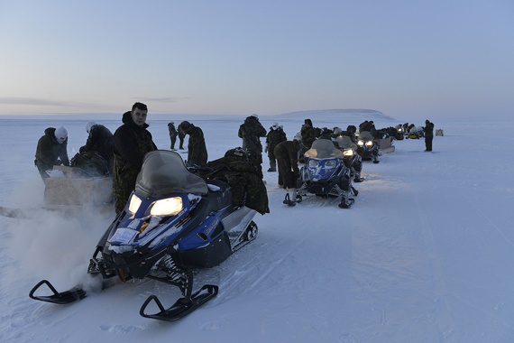 Canadian Rangers and other Canadian Armed Forces personnel on the sea ice along Cornwallis Island as part of a training exercise held in 2015. The CAF is planning more exercises in the area this March. (PHOTO COURTESY OF THE CAF)