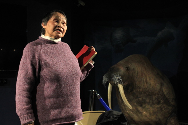 Holding her original script from the 1974 Hollywood film The White Dawn, Ann Meekitjuk-Hanson speaks to a small audience who had assembled Jan. 19 to watch the film at the Unikkaarvik Visitor Centre in Iqaluit. Hanson was a young mother in Frobisher Bay in 1974, part of the first generation of children to move to larger settlements and go to English schools, and she was enticed to act in the film. It was a time of social unrest in Frobisher Bay, Hanson told the audience—lots of gossip, gambling and family breakdown. The White Dawn, based on a true story of southern whalers in 1896 who get separated from their crew and are saved by Inuit, helped Inuit actors and others relearn the culture, skills and language that were being lost, she said. Read more later on Nunatsiaqonline.ca. (PHOTO BY LISA GREGOIRE)