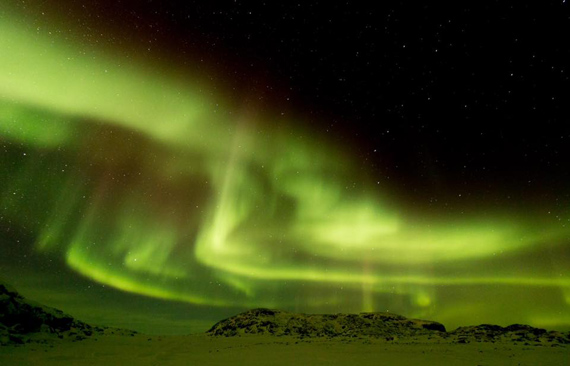 This image by photographer Eric Langdon catches the vibrant green ribbons of the northern lights rippling over Cape Dorset Jan. 18. You can check out more of Langdon's photography on his instagram profile @langdon_eric. (PHOTO BY ERIC LANGDON)
