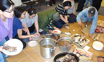 Inuit Studies students enjoy a country food meal in previous year of the program. (PHOTO COURTESY OF NAC)