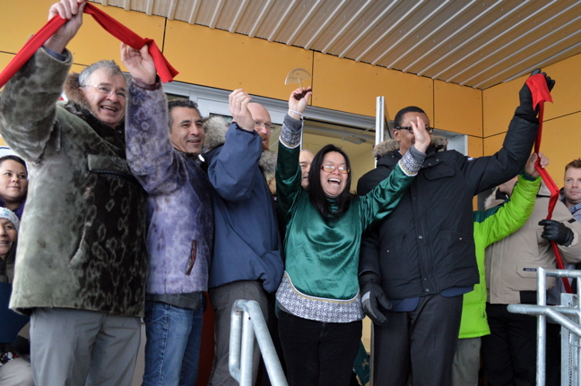 There have been more than a few frowns on the road to Iqaluit's new aquatic centre but it was all cake and smiles Jan. 26 for the centre's grand opening. After the ribbon-cutting and facility tours, Janu-weary Iqalungmiut were invited to don bathing suits and show some skin—and a few tattoos—at the new pool. “There’s going to be more places for the children to go,