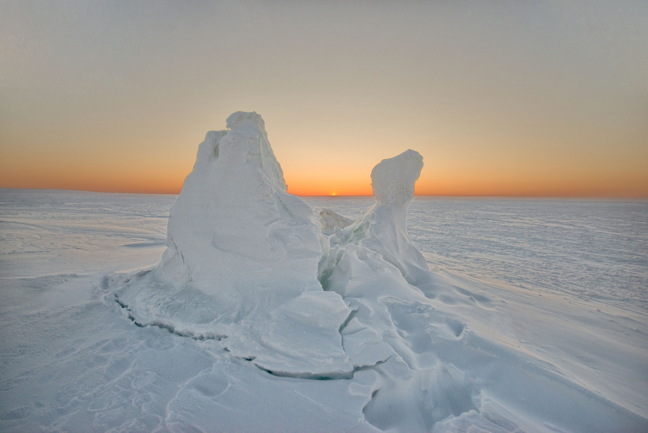 If you look real hard, between this hunk of ice, you will see the return of the sun to Cambridge Bay, Jan. 11 at 11:50 a.m. With the windchill that day, it was about -54 C but residents in that western hub town must have been happy nonetheless, to see the sun return after six weeks of darkness. (PHOTO BY DENISE LEBLEU IMAGES)