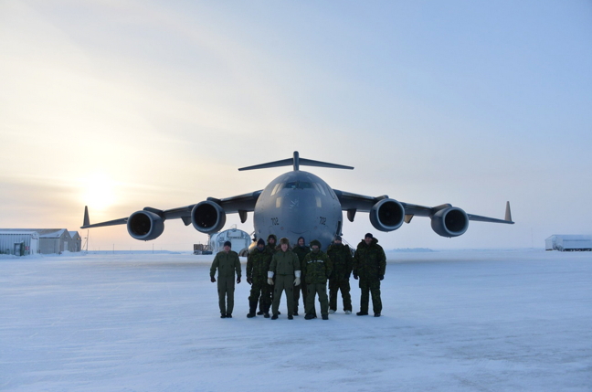 That's a big bird to be landing on frozen gravel. Members of 429 Transport Squadron, from 8 Wing Trenton, landed a CC-177 Globemaster III in Hall Beach Feb. 11 marking the first time that huge cargo plane has successfully landed in that North Baffin community. The weekend visit was part of the squadron's efforts to improve operations in remote northern regions. The CC-177 has now successfully landed on five Arctic-area gravel runways, the others being CFS Alert, Resolute Bay, Cambridge Bay and Station Nord, Greenland. The Greenland stop, in early 2016, came after a request from Denmark for supplies delivery. With four engines and 40,440 pounds of thrust, the CC-177 can carry a payload of up to 72,727 kilograms. (PHOTO BY NEIL WILLIAMS)