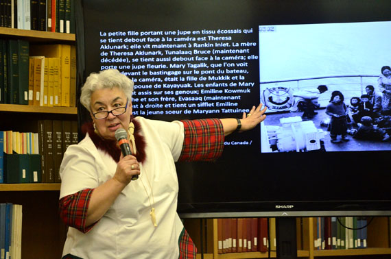 Manitok Thompson, at an event held March 1 at Library and Archives Canada in Ottawa, talks about the family relationships between her and a group of Inuit whose images appear in a photograph taken by Wilfrid Doucette of the National Film Board on the deck of the C.D. Howe off Coral Harbour in July of 1951. This archival photo is one of many thousands, dating from the early years of the 20th century to the 1970s. Under a project called Project Naming, started in 2002 by Morley Hanson and Murray Angus of Nunavut Sivuniksavut, Inuit students at NS, and others, have identified more than 2,000 Inuit, along with places and activities, represented in the federal agency’s archives. This week, Library and Archives Canada celebrated the 15th anniversary of the project with three days of activities. Read Nunatsiaqonline.ca later for more on Project Naming. (PHOTO BY JIM BELL)