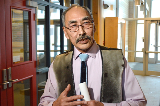 Education Minister Paul Quassa answers questions from reporters after his colleagues in the legislature gave Bill 37, an Act to Amend the Education Act and the Inuit Language Protection Act, second reading March 9. (PHOTO BY STEVE DUCHARME)