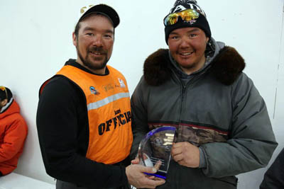 Ivakkak field coordinator Juani Beaulne awards the Adamie Inukpuk Memorial Award for Sportsmanship to Kangiqsujuaq musher Sandy Jaaka, who was selected by his fellow competitors as this year’s recipient. (PHOTO BY P. DUNNIGAN/MAKIVIK)