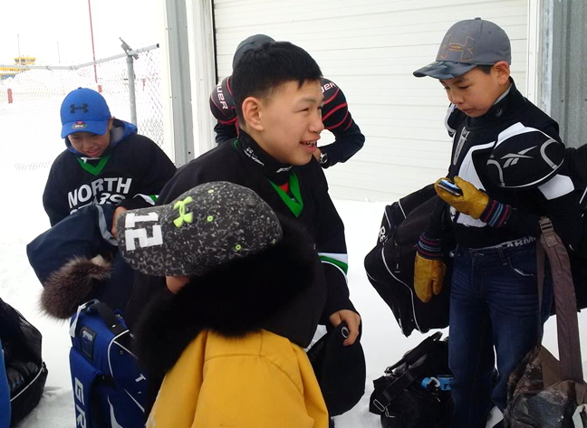 No body checking please, or bag checking for that matter... members of the Coral Harbour peewee hockey team including forward Tristin (Ron) Matoo, the team's