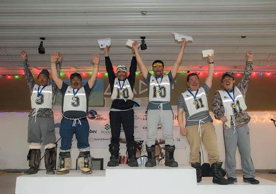 Ivakkak's first, second and third-place winners take the podium April 15 at an awards ceremony in Ivujivik. (PHOTO BY P. DUNNIGAN/MAKIVIK)