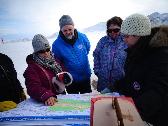 A new subdivision near Joamie Elementary School in Iqaluit: That's what the City of Iqaluit's director of planning and developing Mélodie Simard discusses May 3 during a public walking tour of the proposed Joamie Court extension, which could see up to 66 new residential units built. To Simard's right, Doug Workman, the president of the Iqaluit District Education Authority, and Catherine Hoyt, also from the IDEA, who expressed concerns about the safety of students going to and from the school, if there's increased residential traffic due to the new construction.