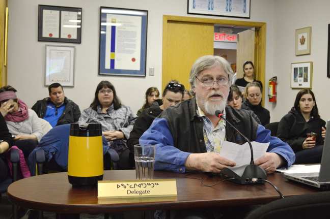 Barry Cornthwaite, capital planning manager for the Government of Nunavut's education department, speaks during a public meeting on Iqaluit's proposed Joamie Court subdivision in council chambers May 9. (PHOTO BY STEVE DUCHARME)