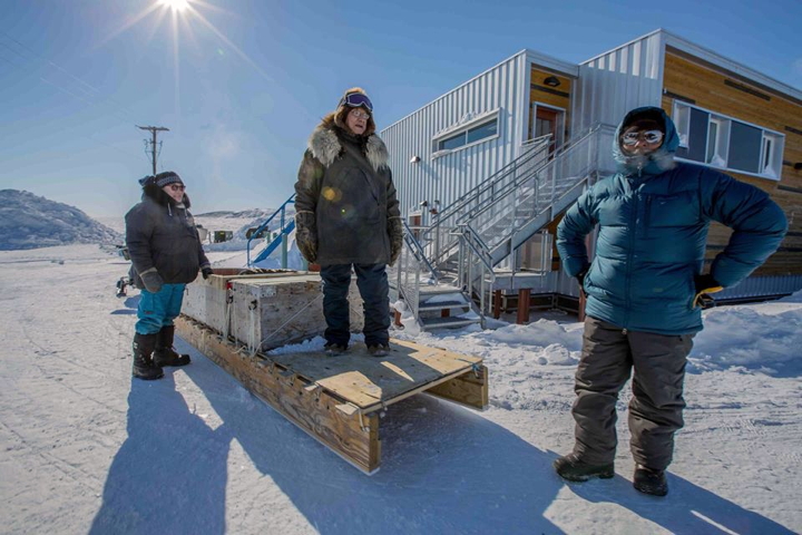 Getting ready for a daytrip picnic to an iceberg near Clyde River. From left: Clyde River's Jacob Jaypoody, George Noongwook from Alaska and Elijah Palituq, from Clyde River. (PHOTO BY ROBERT KAUTUK)
