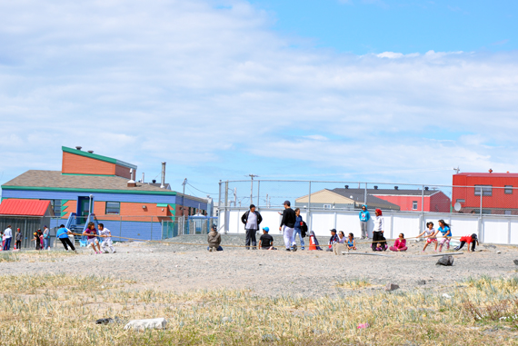 Students of Kiluutaq school in Umiujaq play tug-of-war and other outdoor games in the warm weather May 30. Kiluutaq, one of three Nunavik schools taking part in a cultural calendar pilot project, finishes the school year June 1. (PHOTO BY SARAH ROGERS) 