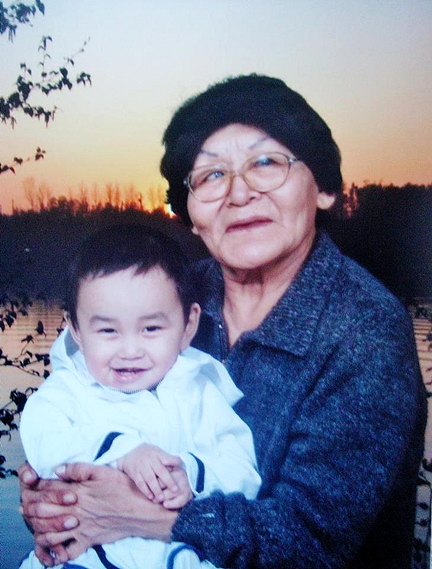 Elder Agnes Turner, who just turned 70, with her grandson. Turner finally got her own classroom of Grade 3 and 4 students last fall, decades after getting her teacher training. (PHOTO COURTESY A. TURNER)