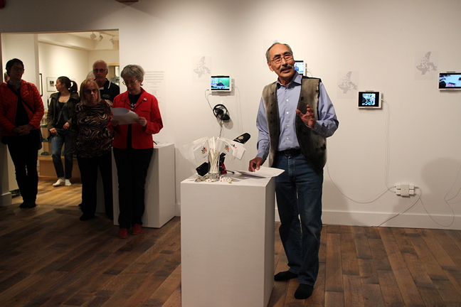 Nunavut Education Minister Paul Quassa speaks in Iqaluit May 30 at the opening of a video installation which shows life in Nunavut’s 25 communities.
