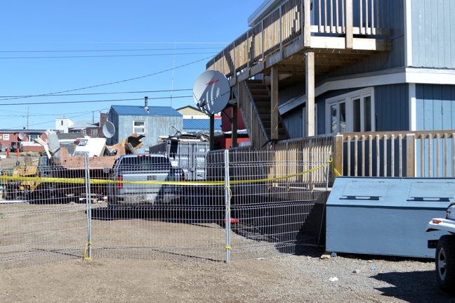 The scene of the July 6 explosion in Iqaluit shows the remains of splintered boat. (PHOTOS BY STEVE DUCHARME)