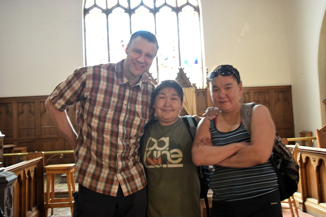 David Chapman, director of the Open Door shelter in Montreal, in the current church they occupy, St. Stephen's, with two women who frequent the shelter for food or to sleep in the pews. (PHOTO BY COURTNEY EDGAR)