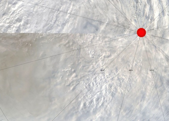 This MODIS satellite sensor image shows smoke edging up to the North Pole.