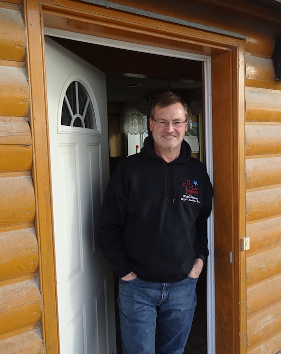 Keith Peterson, seen here in the doorway of his Cambridge Bay home, is leaving Nunavut political life. Peterson, minister of finance and justice, decided after 14 consecutive years as MLA that he would not run again for re-election in the Oct. 30 election. (PHOTO BY JANE GEORGE)