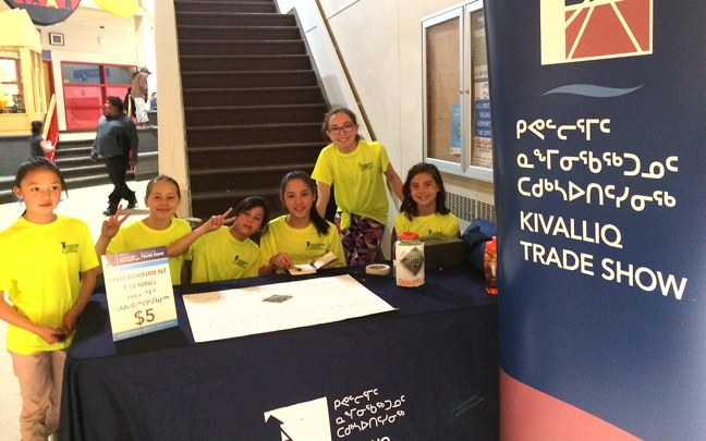 Members of Rankin Inlet's Aqsarniit Ujauttaq Gymnastics Club, at this year's 2017 Kivalliq Trade Show, running the door Sept. 26 to the evening's entertainment, which included a performance by Beatrice Deer. The club, which has about a dozen members, got to keep the proceeds from the door to help pay for upcoming competitions in Las Vegas, Vancouver and Austria. This year's Kivalliq Trade Show wrapped up in Rankin Inlet Sept. 27 with a banquet and auction sponsored by Agnico Eagle Mines Ltd. (PHOTO BY AMANDA EECHERK)