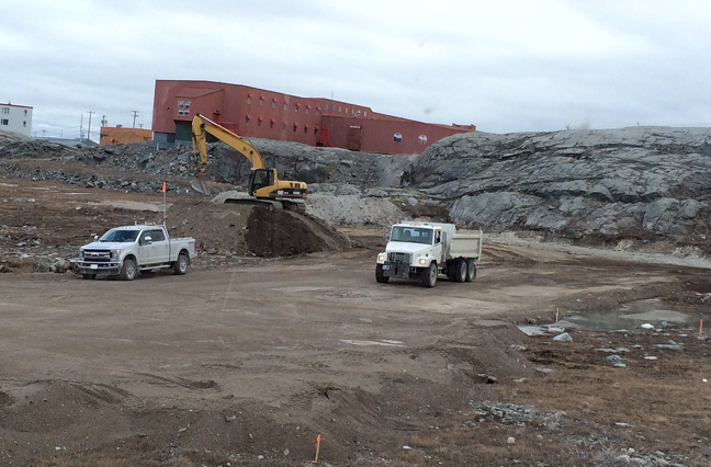 Municipal staff with the Hamlet of Rankin Inlet level and smooth out a section of land off Tuprivik Avenue in preparation for a new arena which is expected to be built next summer. The current arena is old and in constant demand for local sports and functions so many community members are excited about the prospect of a bigger, more modern facility. (PHOTO BY AMANDA EECHERK)