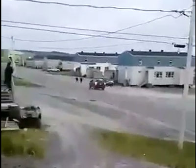 A still screen from video footage shows a black vehicle just before a driver ran into two pedestrians Sept. 2 in Umiujaq. 