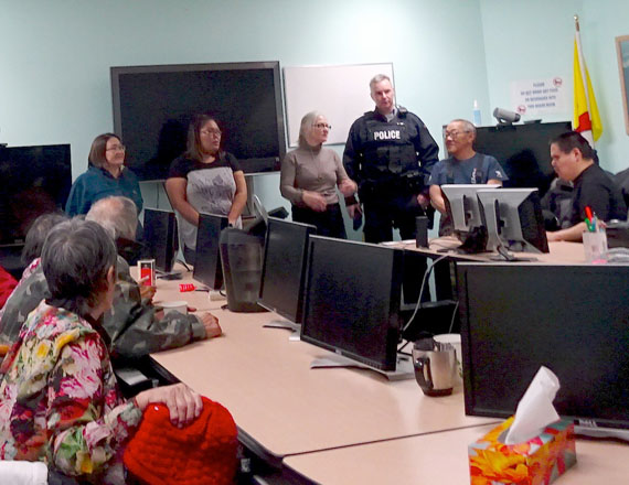A change of the guard: New Cambridge Bay RCMP Cst. Mike McKenna meets with elders and other community members Oct. 5 during an event hosted by Community Justice and Legal Aid staff members. From left to right: Bernice Lyall, Elaine Zikalala, Donna Hakongak-Olsen, McKenna, and interpreter Jimmy Haniliak. The RCMP detachment, whose Sgt. Jean-Guy Lalonde left the community last week to serve as new deputy chief to the Kativik Regional Police Force in Nunavik, remains short-staffed, McKenna said, thanking residents for their patience. The detachment's new contingent of recently arrived officers all come from the Maritimes, McKenna told the gathering.