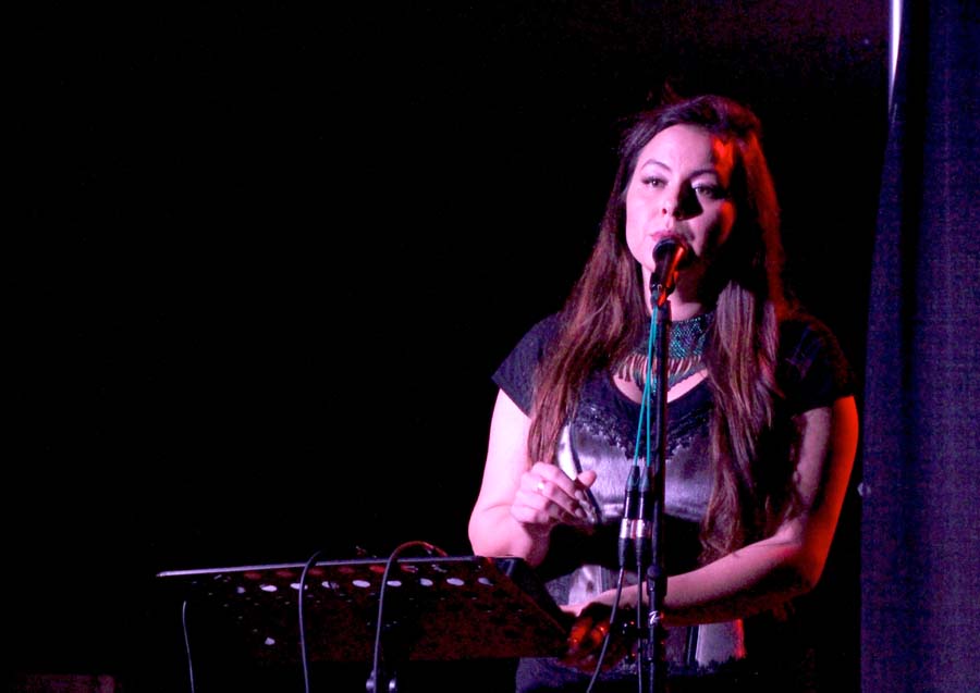 Inuk throat signer and musician Tiffany Ayalik, half of the Yellowknife-based duo Quantum Tangle, performs for a crowd at Joamie school in Iqaluit Nov. 1. Quantum Tangle was one of a number of performers from Yukon, Northwest Territories and Nunavut who took part in the show called From the North, a Canada 150 initiative that is touring Canada this year. The line-up included Nunavummiut performers IVA and Riit along with NÀGHA, Sophie Villeneuve, Borealis Soul, the Dakhká Khwáan Dancers and DASH. See Nunatsiaq News' Facebook page for more photos from the Iqaluit show. (PHOTO BY BETH BROWN)
