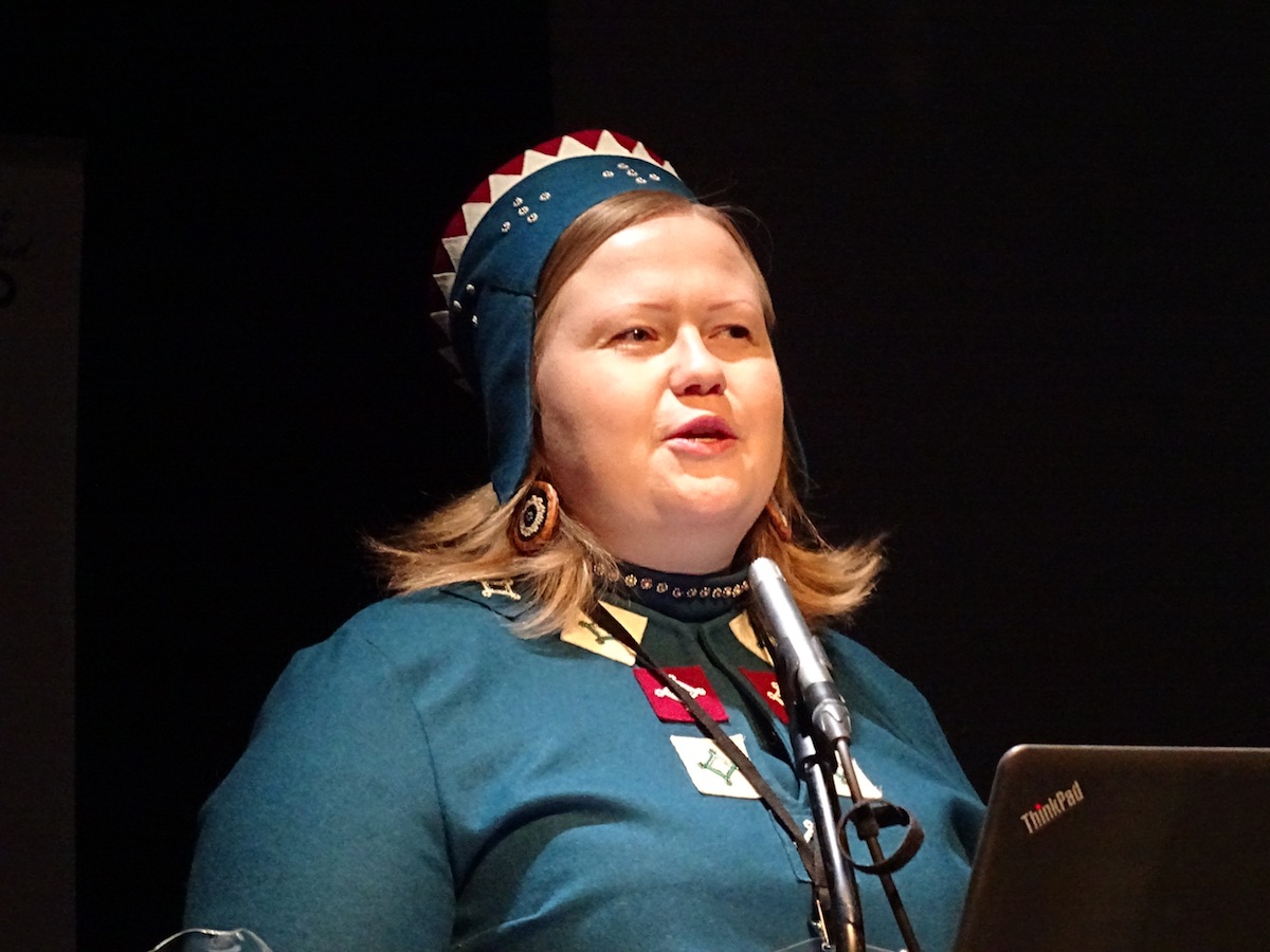 Saami Parliament President Tiina Sanila-Aikio reminds participants at the Arctic Spirit conference in Rovaniemi, Finland about the role and needs of Saami and other Indigenous Arctic peoples during her Nov. 15 keynote speech. (PHOTO BY JANE GEORGE)