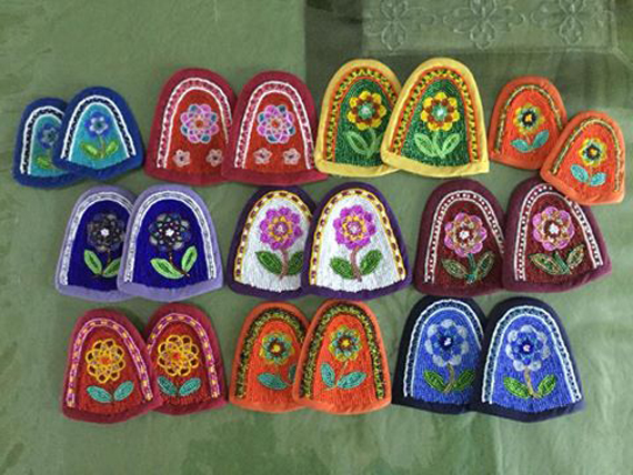 This photo showing a colourful selection of qalliniit, the beaded tongues that decorate kamiks, was posted for sale on Kuujjuaq's sell and swap page this week. The exquisite embroidery was all done by well-known seamstress and author Dorothy Mesher, who turns 85 next month. There are still some qalliniit left for sale at house 1275-B in Kuujjuaq. (PHOTO COURTESY OF S. CAIN)