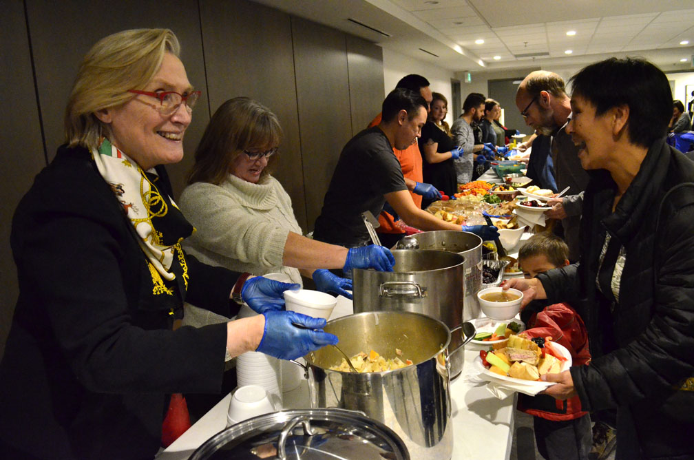 Carolyn Bennett, the minister of Minister of Crown-Indigenous relations and northern affairs, dishes out food at an Inuit Day event in Ottawa this past Nov. 7: “We celebrate the vibrant culture, rich history, and fundamental role Inuit play in Canada and the world,” she said in a statement that bragged about her government's relationships with Inuit organizations. (PHOTO BY JIM BELL)