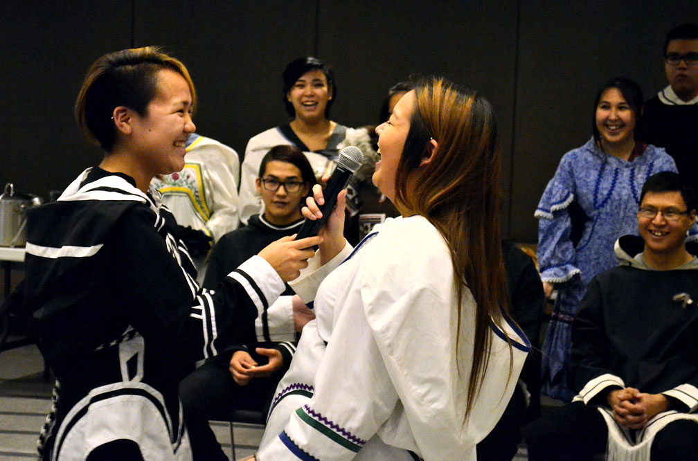 Students from the Nunavut Sivuniksavut college program throat-sing at the Nov. 7 gathering in Ottawa held to mark International Inuit Day and the 40th anniversary of the Inuit Circumpolar Council's creation in 1977, as well as the birthday of ICC founder Eben Hopson. The celebration also marked the 30th anniversary of Inuit Tungasuvvingat, an Ottawa-based Inuit service agency. (PHOTO BY JIM BELL)