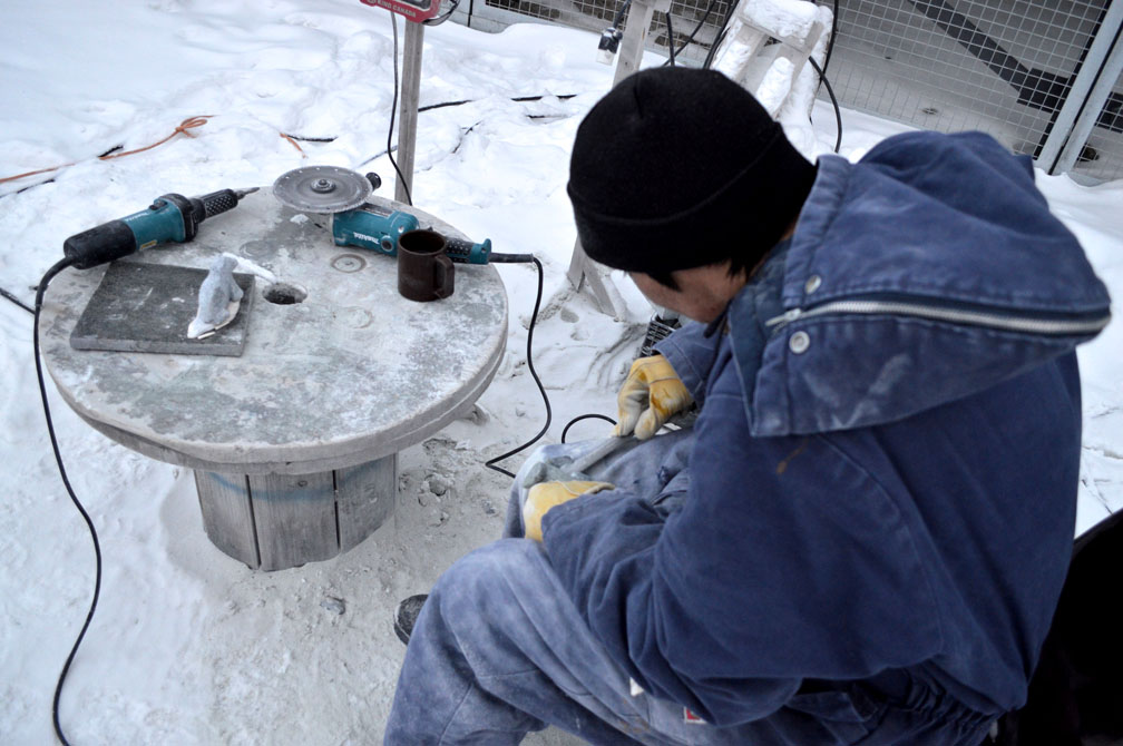 Ottokie Samayualie, 37, makes around eight to ten carvings a day for a weekly craft sale at the Makigiarvik Correctional Centre in Iqaluit. (PHOTO BY STEVE DUCHARME)