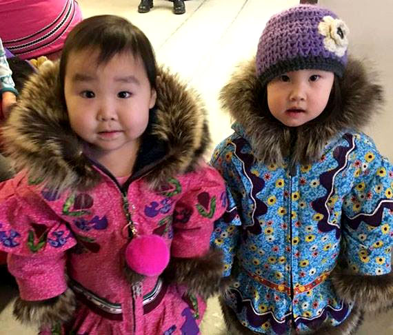 Here's our fifth most popular photo of 2017, based on numbers of views, likes and shares on the Nunatsiaq News Facebook page: Cousins Erica Taipana of Cambridge Bay, aged 22 months and Ophelia Bolt of Kugluktuk, aged 20 months, model new winter parkas earlier this year. The traditional Kitikmeot-style parkas are the creations of their grandmother, seamstress Lucy Taipana of Kugluktuk. Nunatsiaq News will not publish a print paper on Friday, Dec. 29. We'll publish our first print paper of 2018 on Jan. 5. Our office will re-open Jan. 2. (PHOTO COURTESY OF JAMIE TAIPANA)