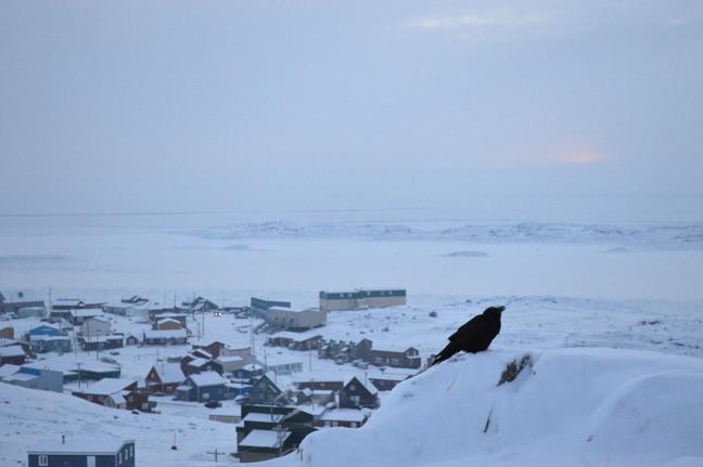 That small patch of orange in the sky is all that's left of the sun as it sets on the shortest day of the year, or the winter solstice, in Iqaluit on Dec. 21. Although the sun fell below that horizon at about 1:42 p.m., Iqalungmiut can look forward to a little more sunshine every day until the summer, starting with about 8 seconds more daylight tomorrow. (PHOTO BY STEVE DUCHARME)
