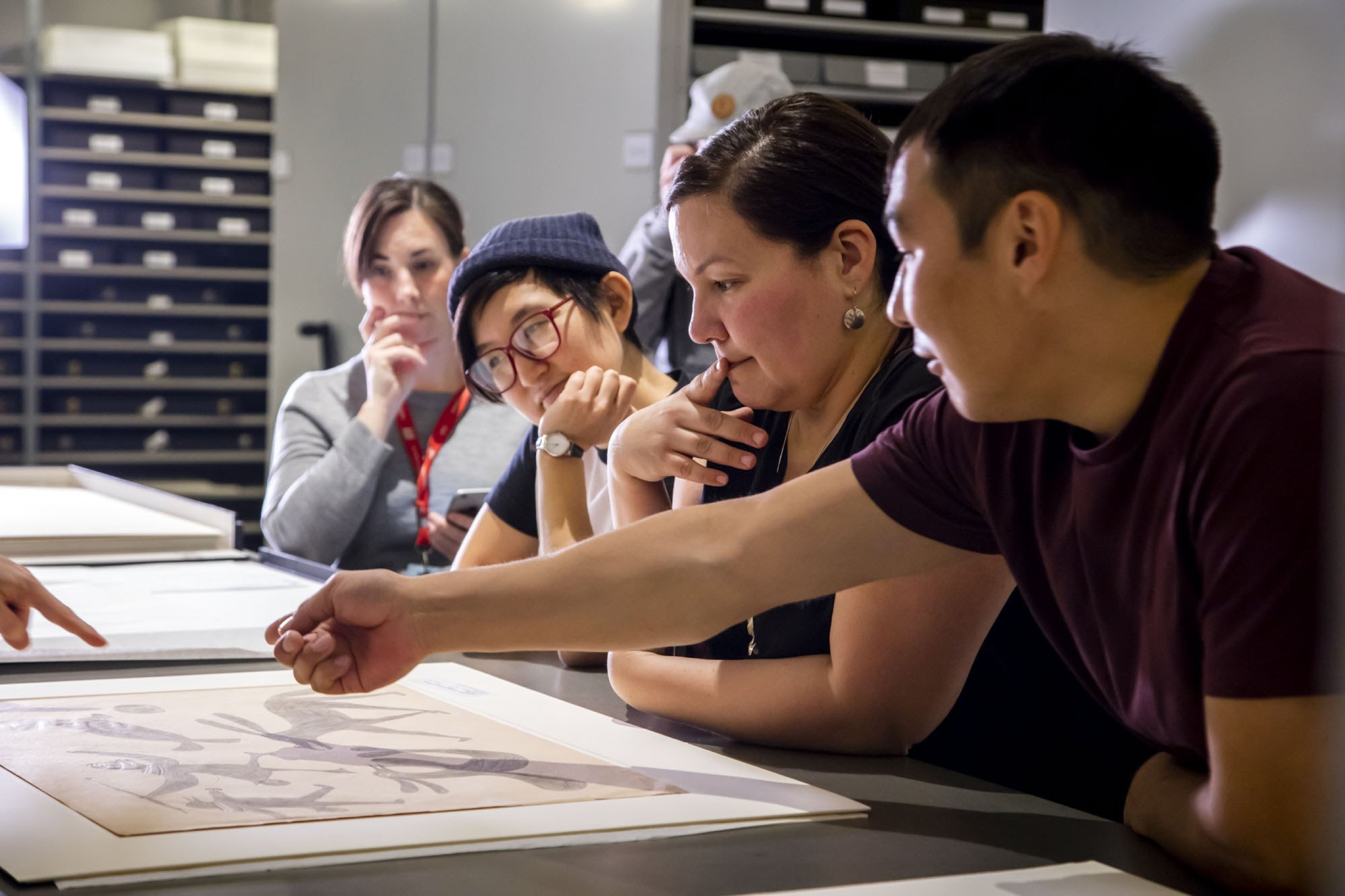 Planning is underway for this summer's major exhibition of works by Kenojuak Ashevak and her nephew Timootee (Tim) Pitsiulak, which starts Saturday, June 16, at the Art Gallery of Ontario in Toronto. From left: Art Gallery of Ontario project manager Hillary Taylor with curatorial team members Jocelyn Piirainen, Taqralik Partridge and Kuzy Curley. (PHOTO COURTESY OF THE AGO)