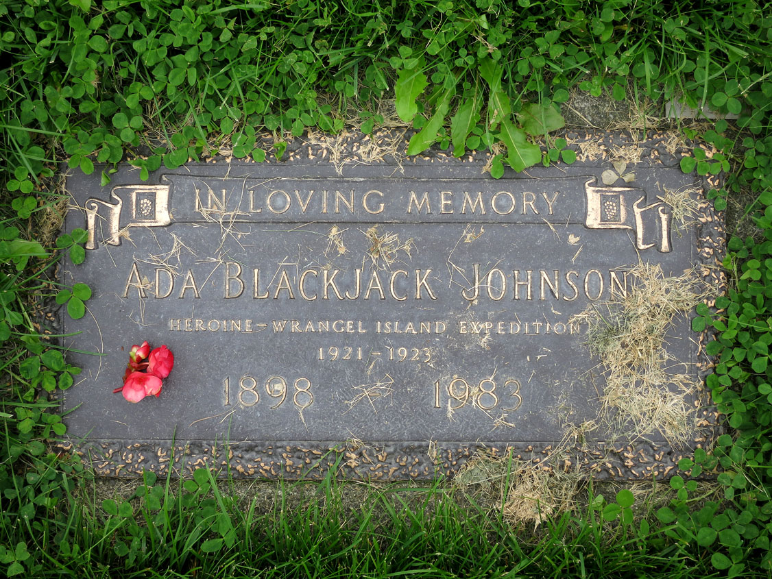 The grave of the Inupiaq heroine Ada Blackjack at Memorial Park Cemetery, Anchorage, Alaska, with a flower placed there by the author of this article. (HARPER COLLECTION)