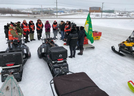 The Kuujjuaq Canadian Rangers patrol took off by snowmobile on Thursday, March 15 for Tasiujaq for their annual winter training out on the land. Some of their family members came out to wish them well, as did Mayor Tunu Napartuk, who said a prayer. (PHOTO BY ISABELLE DUBOIS)